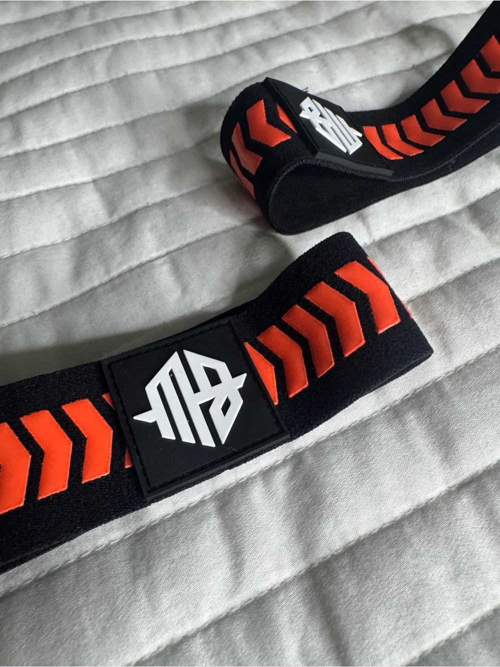 BREEDWELL Adjustable Black and Orange Arm Bands for Men